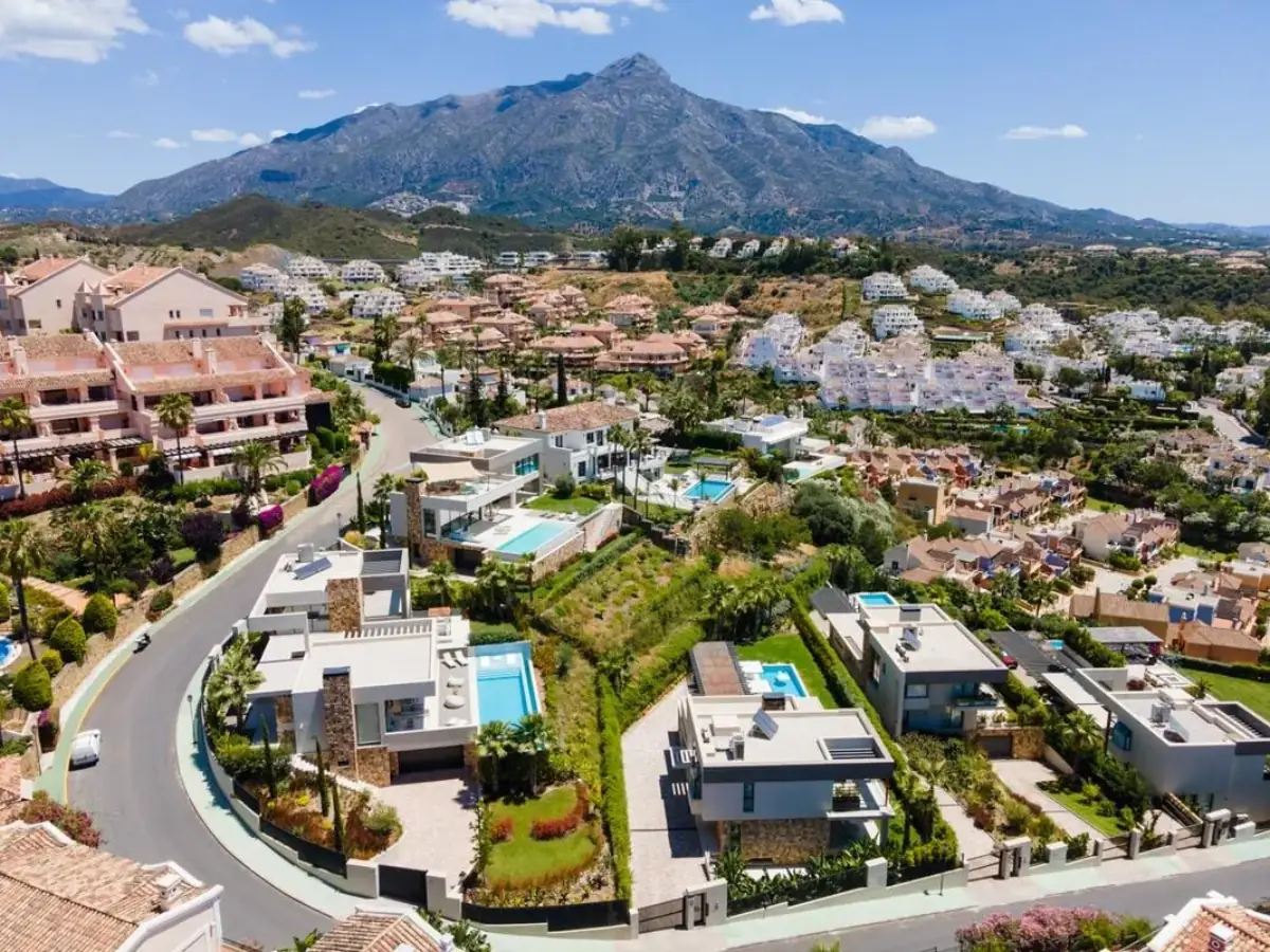 Golf valley properties surrounded by lush greenery in Nueva Andalucía