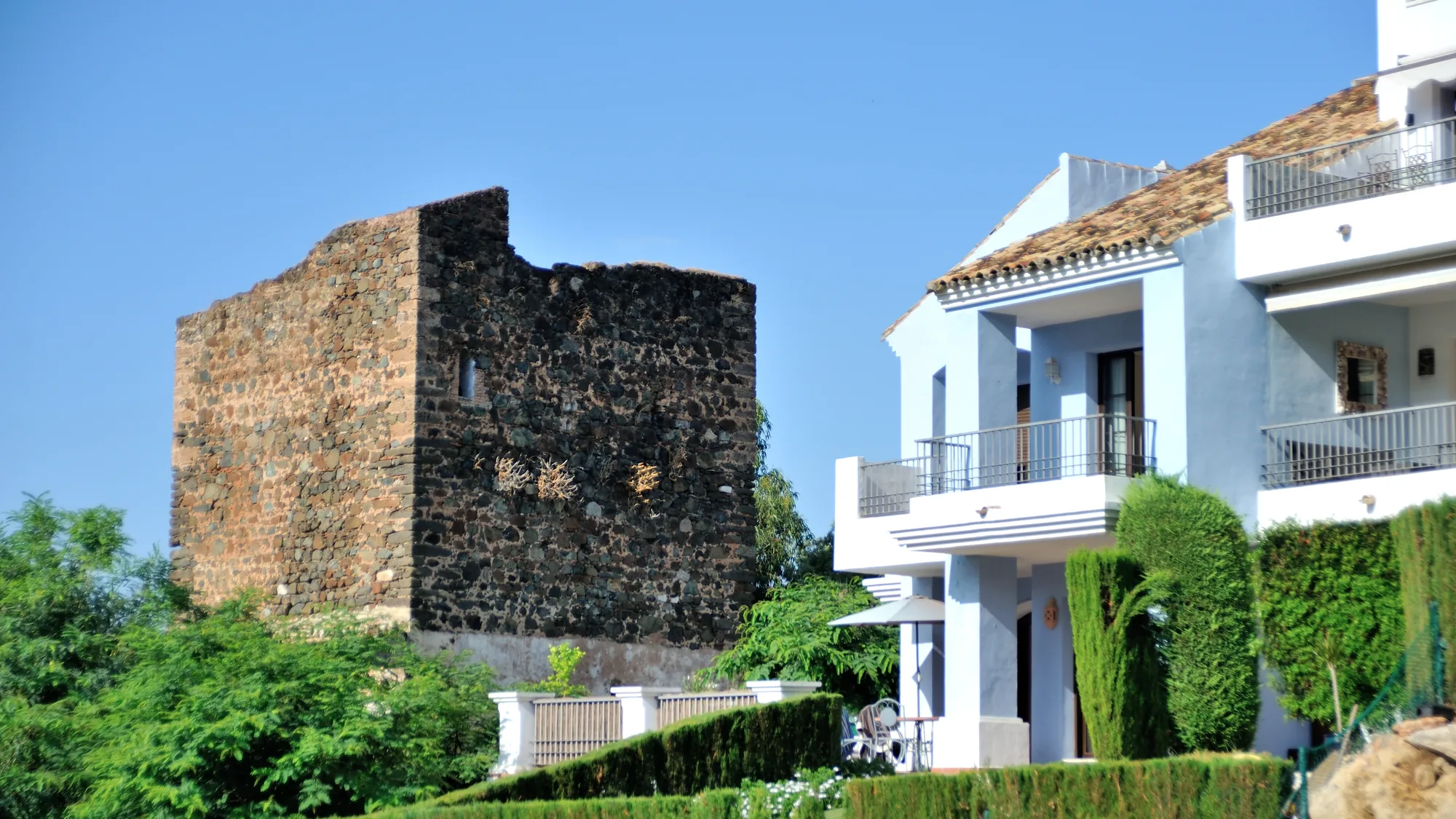 Residential housing beside the Torre Estéril watchtower in Benahavís municipality, Málaga