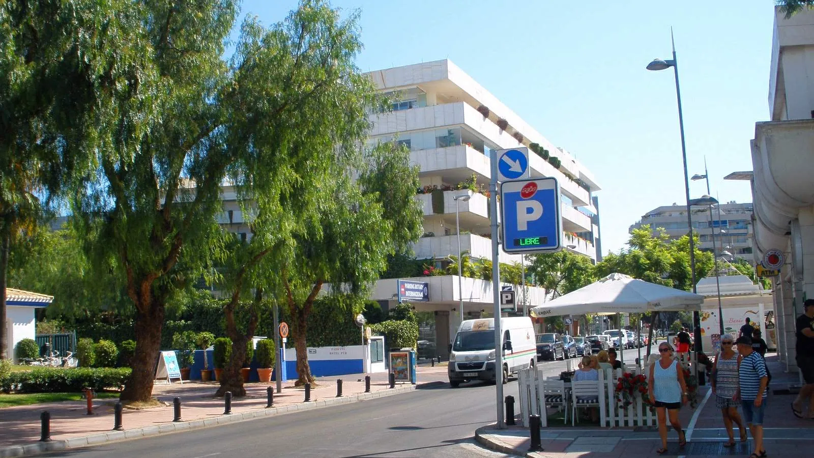 Apartment building in Nueva Andalucía, Marbella, with stepped upper floors and planted terraces